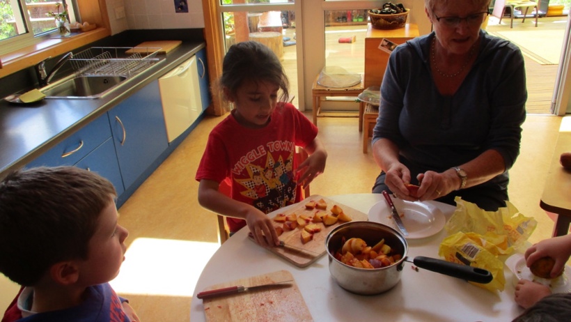 making peach cobbler- We harvested the peach from our orchard as well.jpg