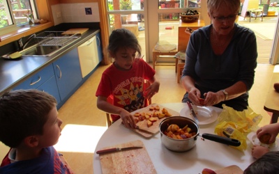 making peach cobbler- We harvested the peach from our orchard as well.jpg